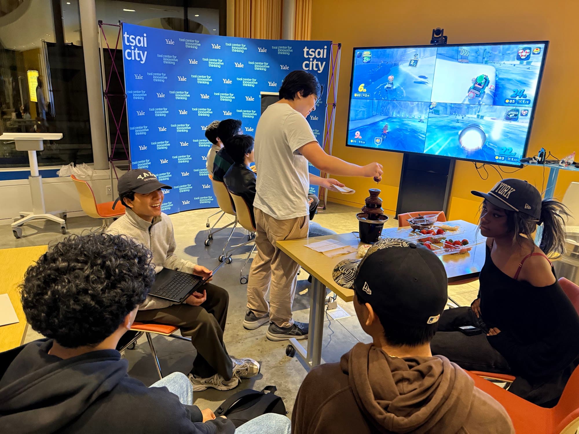 Members playing video games at Tsai CITY