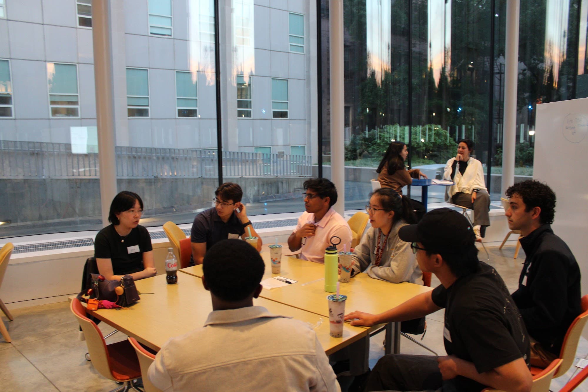 Catalyst members talking around a table